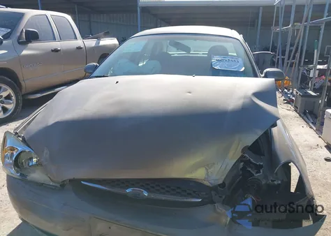 2003 Ford Taurus Ses z USA, uszkodzony, nr VIN 1FAFP55243G138459